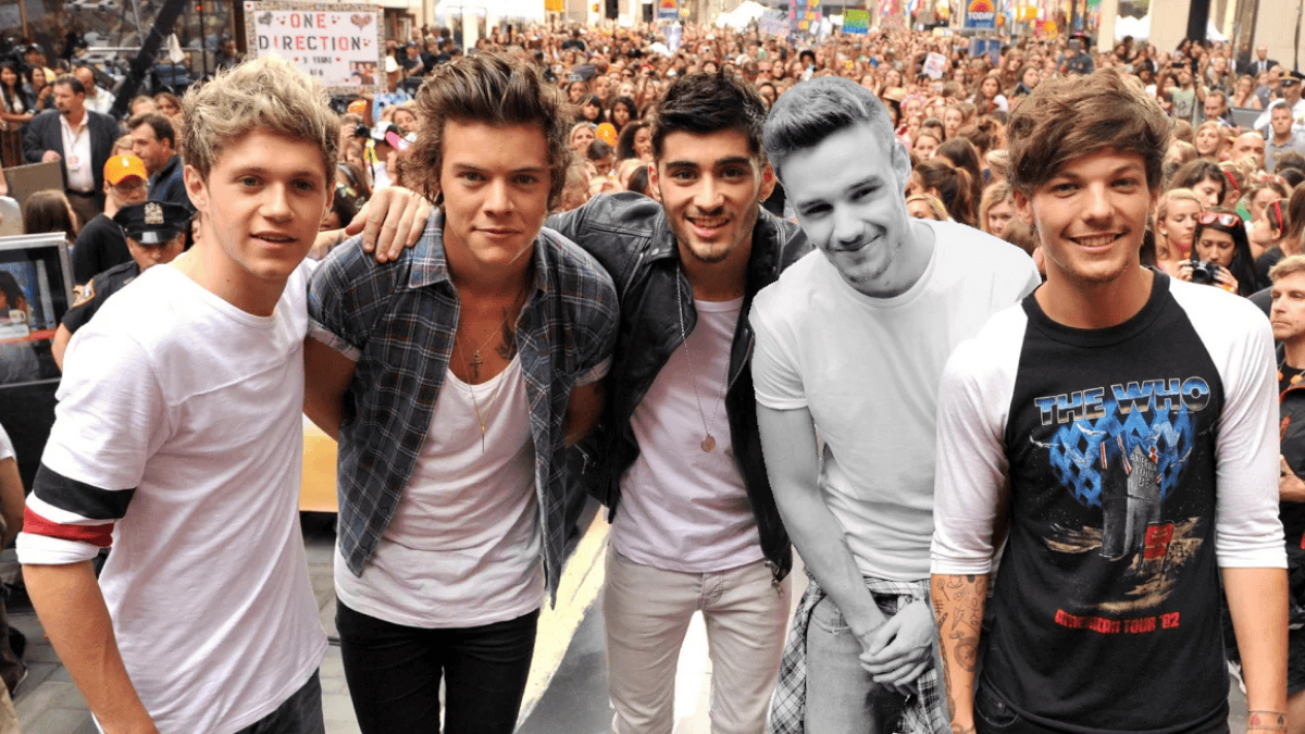 an old image of One Direction members with black and white Liam Payne